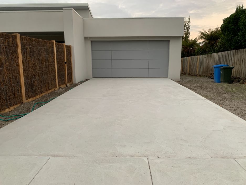 Concreters Frankston installing a new concrete driveway and crossover